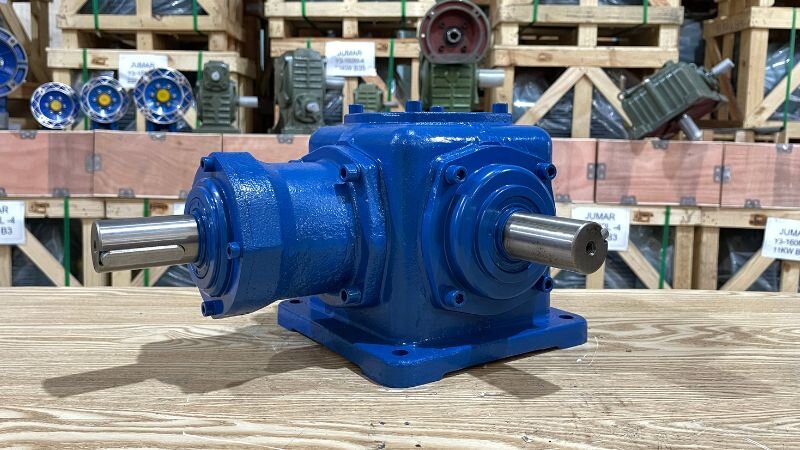 A T-Series Right-Angle Bevel Gearbox is a mechanical device used to change the transmission direction